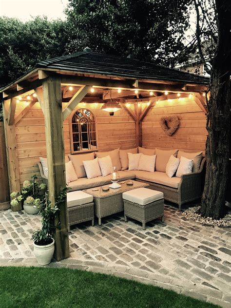 homemade wooden gazebo cobbles garden lights outdoor sofa outdoor seating alfresco lounging