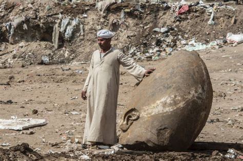 giant ancient egyptian pharaoh statue found underneath cairo slum
