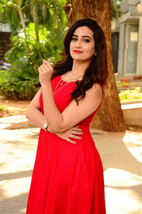 hot stills of anchor manjusha in red dress actress album