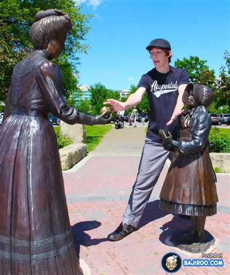 21 Pictures Of Funny People Posing With Statues —
