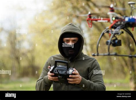 man flying   drone stock photo alamy