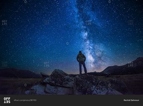 man standing beneath  starry night sky  hope valley  lake tahoe