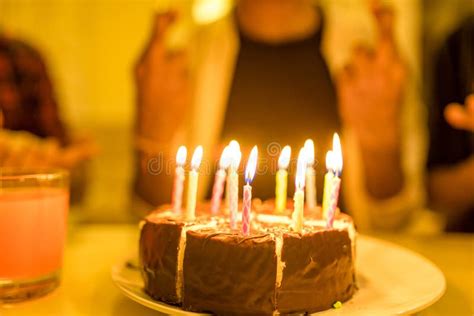 Excited Arabian Man Ready To Blow Out Candles On Cake On Birthday Party