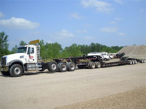 heavy hauling services  reiner contracting  lowboy trailers