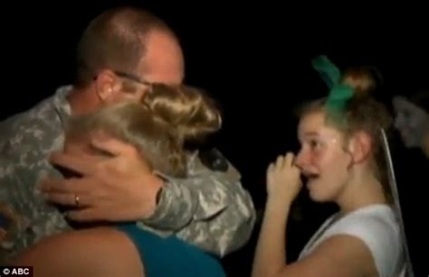 soldier kelly carrigan surprises daughter with an early homecoming at school dance daily mail