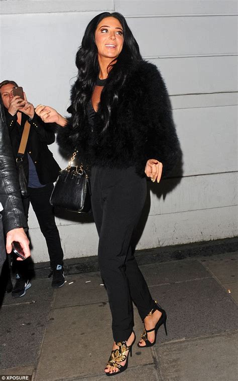 tulisa shows off her cleavage in black catsuit at metro