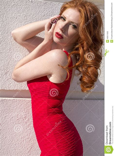 Beautiful Woman With Red Hair And Freckles Stock Image