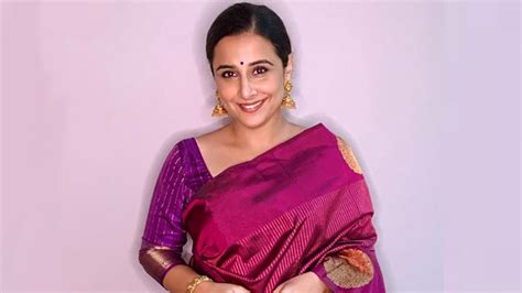 vidya balan in a purple kanjeevaram silk sari and blouse with gold