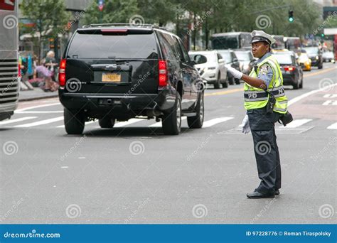 police woman is directing traffic editorial photo image of helping