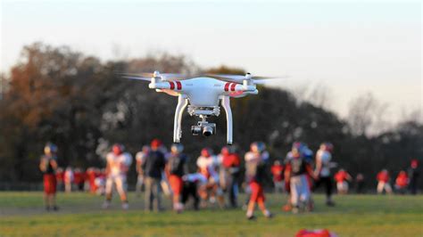high schools  drones  capture football action elgin courier news