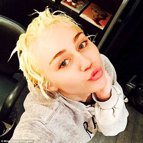 miley cyrus makes effort to smarten up in conservative outfit following