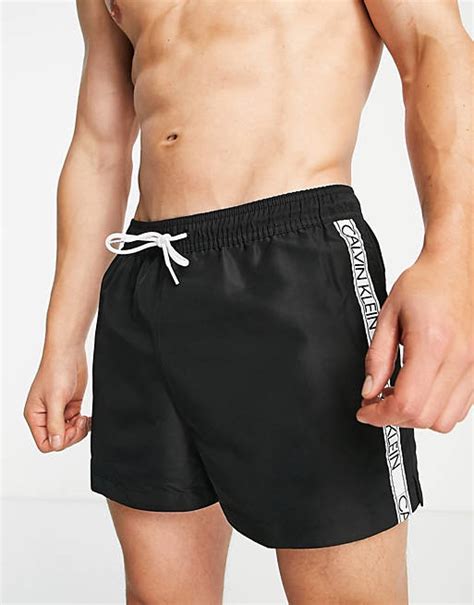 Calvin Klein Tape Logo Short Length Swim Shorts In Black Asos