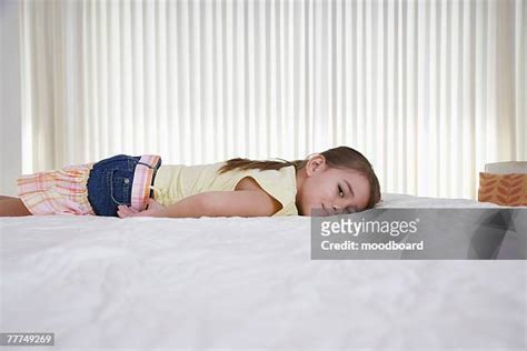 Girl Lying Face Down Photos And Premium High Res Pictures Getty Images