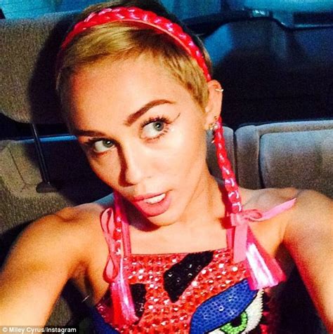 miley cyrus takes to stage for sunrise wearing lips leotard in sydney daily mail online