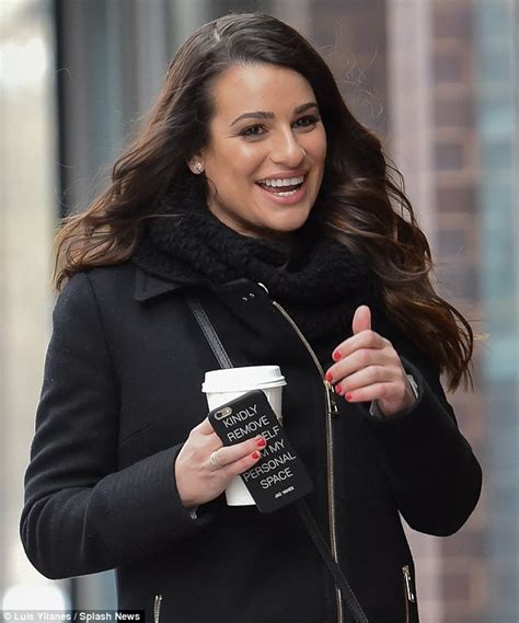 lea michele shares catty message on back of her cell phone in new york city daily mail online