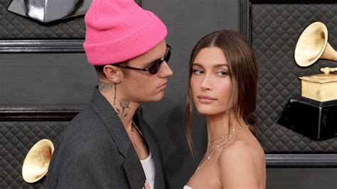hailey bieber wows in silky wedding dress alongside very quirky justin