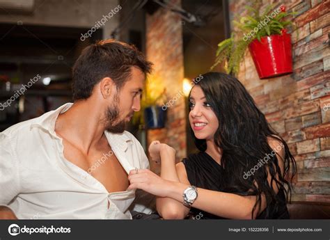 girl pulling  shirt girl pulling shirt   boyfriend stock photo  cherriesjd
