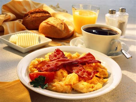 Breakfast With Scrambled Eggs And Bacon Coffee Orange