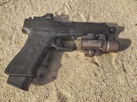 naval special warfare nsw adopts glock   compact combattactical mm pistol