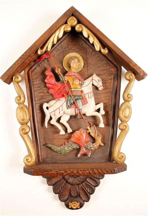 sold  auction wooden folk art   wood saint george
