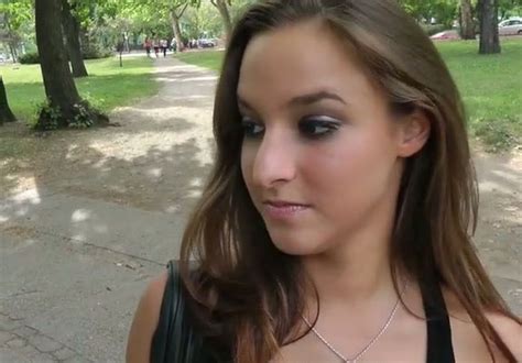 alluring brunette girl gives awesome blowjob in public park