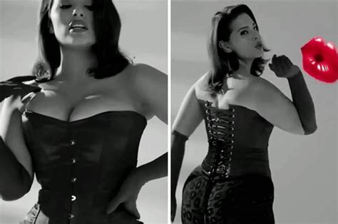 ashley graham squeezes cleavage into corset in love advent