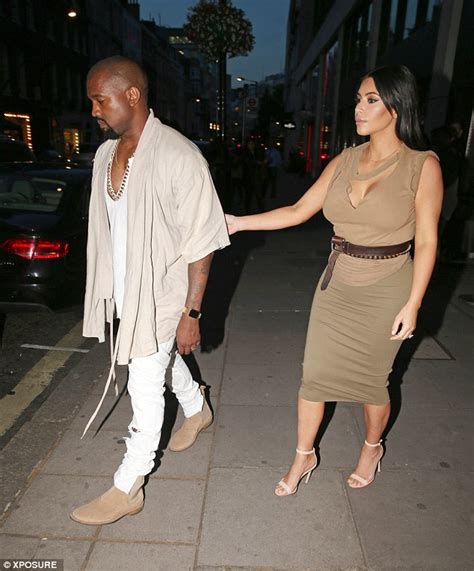 pregnant kim kardashian flaunts her assets with kanye west in london