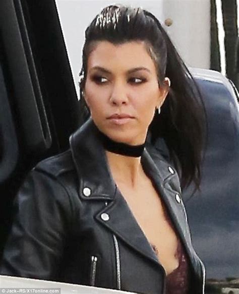 Kourtney Kardashian Wears Collar And Plunging Neckline At