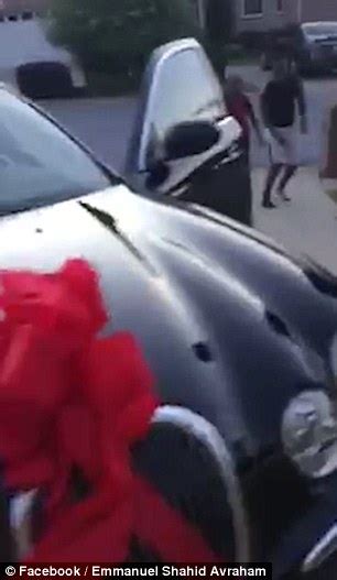 wife laughs hysterically as her husband surprises her with a new car