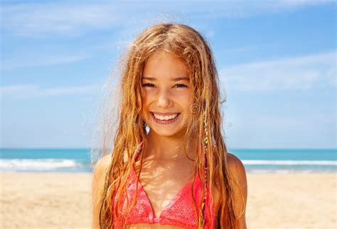 smiling long hair blond girl on the beach stock image image of face