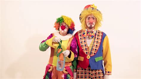funny female clown teasing male circus clown stock footage sbv