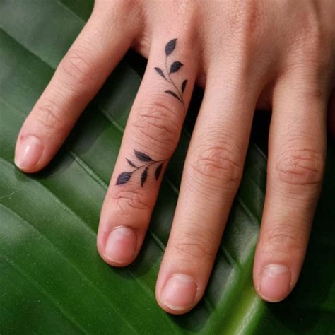 tiny finger tattoos  define perfection tattooblend
