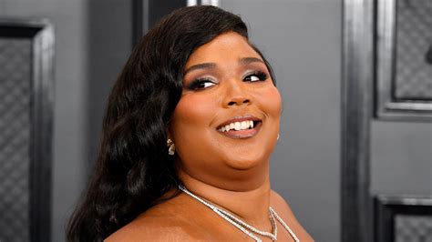lizzo calls  body shamers    workout video allure