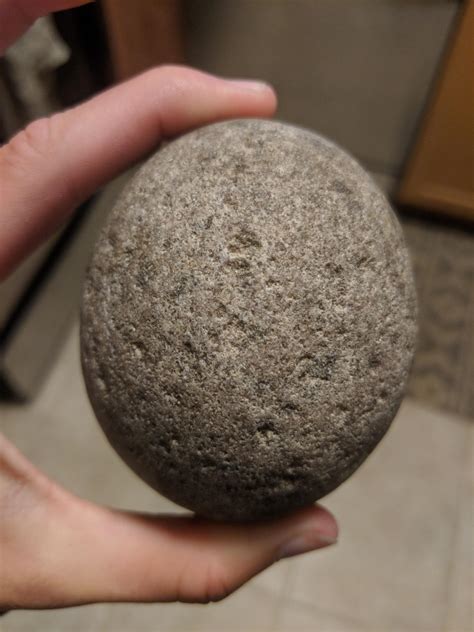 perfect egg shaped rock    yellowstone   man