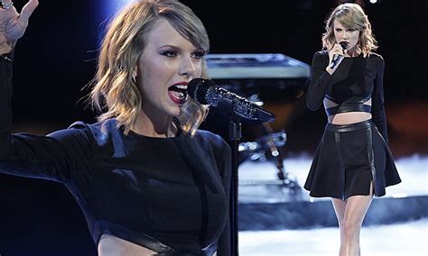 Taylor Swift Flashes Her Tummy As She Jokes About Her