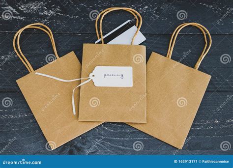 sellers success concept group  shopping bags  payment card  price tag  pricing