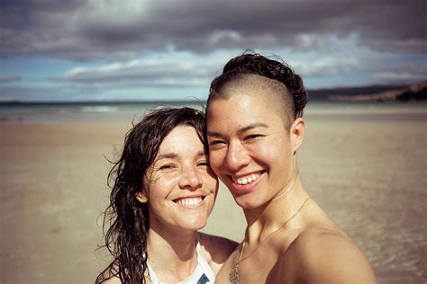 Romantic Happy Selfie By Lesbian Couple On Beach Photograph By Cavan Images