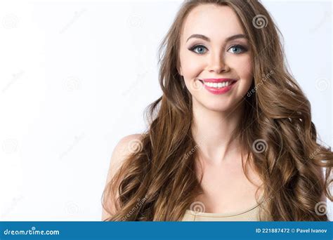Authentic Portrait Of A Beautiful Young Woman With A Healthy Smile