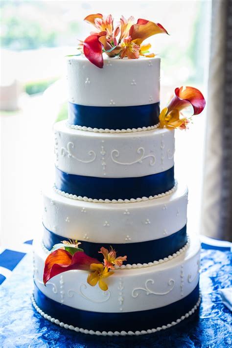 Four Tiered Wedding Cake With Navy Stripes