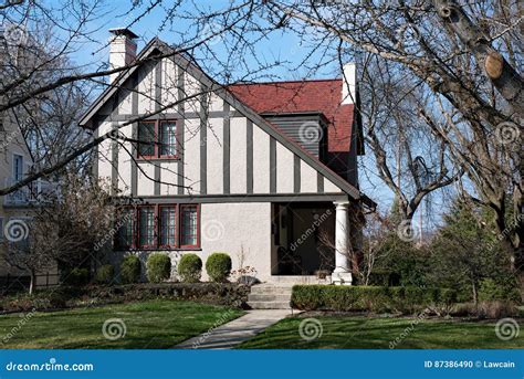 cottage  slanted roof stock photo image  hedge