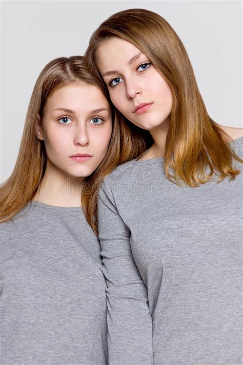 Two Twin Sisters Snuggled Portrait Stock Image Image Of Happiness
