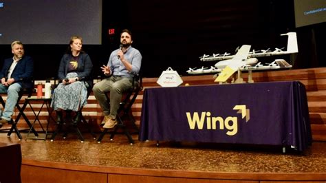 wing holds hands  town hall  frisco   delivery drone launch community impact