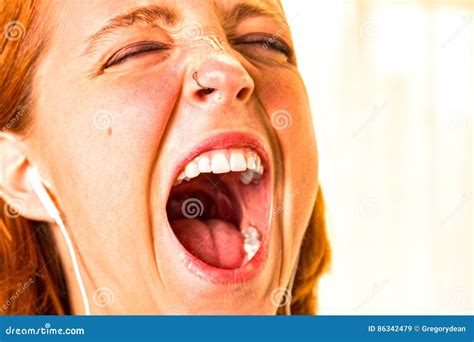 redhead girl with mouth wide open stock image image of listening