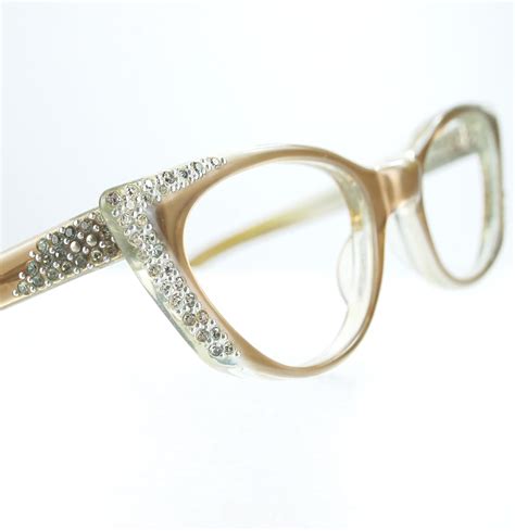 pointy tan rhinestone cat eye glasses or sunglasses frames