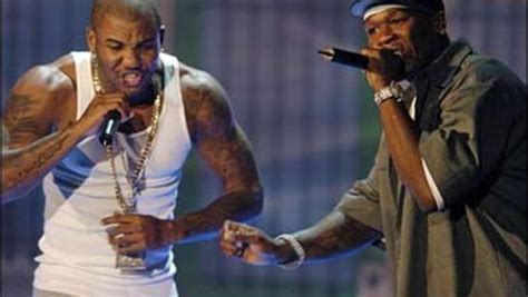 feuding rappers declare truce cbs news