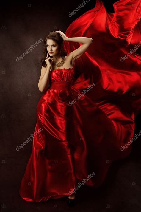 Woman In Red Dress With Flying Fabric Gown Cloth Flowing