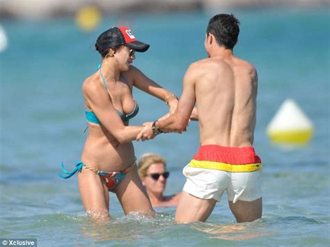 cristiano ronaldo and irina shayk show off their incredible beach bodies as they frolic in the