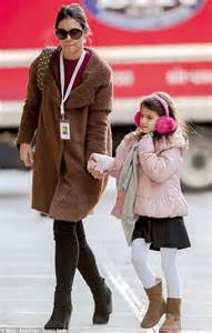 Suri Cruise Wears Fluffy Ear Muffs With Her Makeup Free
