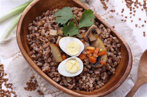 buckwheat porridge with mushrooms and quail egg stock image image of
