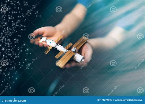 space satellite orbiting  blue planet stock photo image